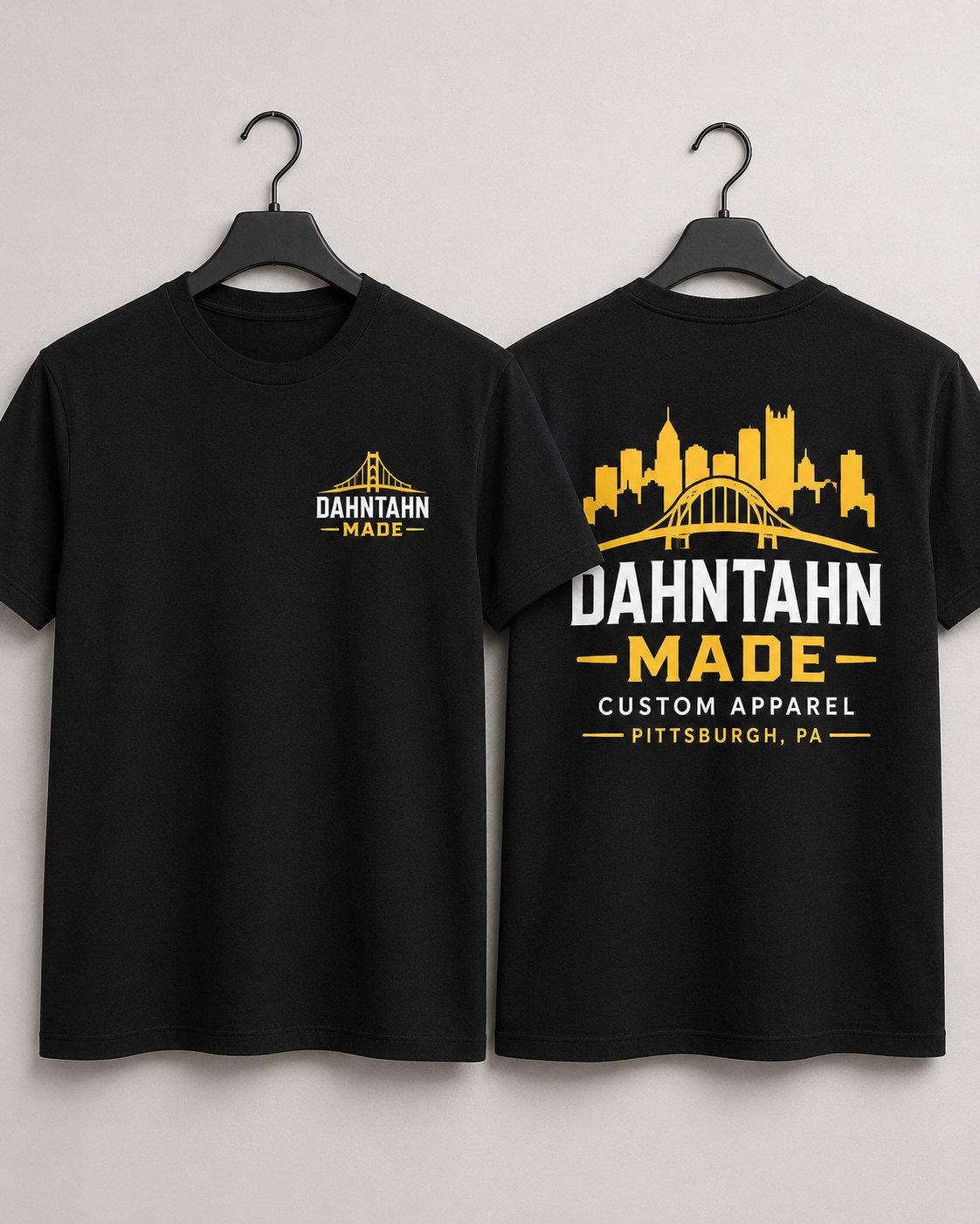 Front and back black T-shirt mockups showing a small left-chest graphic and a large back print