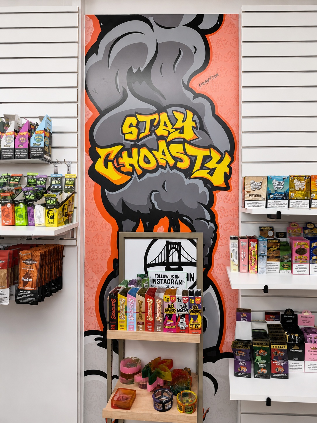 Stay Choasty wall graphic centered in a retail product display
